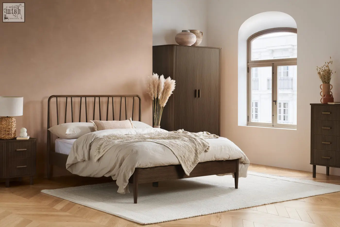 Dark wood bed with metal headboard and light bedding from the exquisite fluted bedroom range perfect for cozy rooms