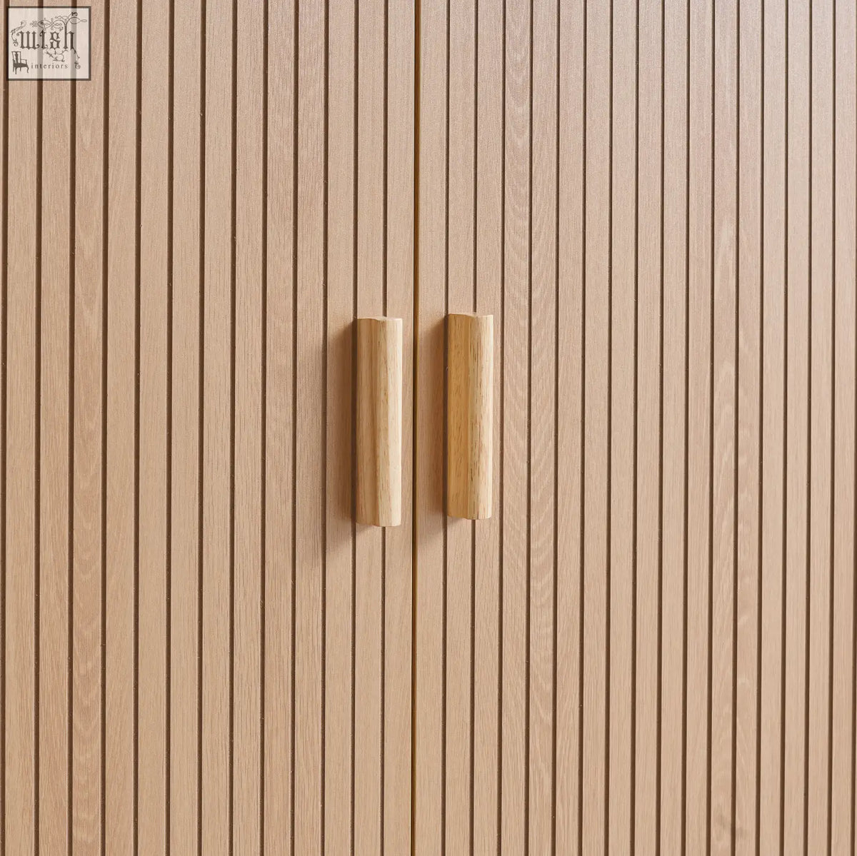 Axel wardrobe 2 door with light oak wooden cabinet doors and matching cylindrical handles from the exquisite fluted bedroom range