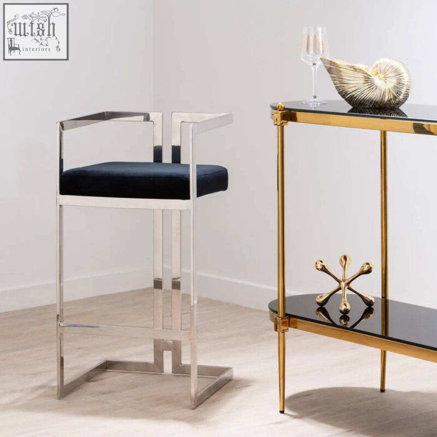 Modern azalea bar stool with silver chrome frame and plush navy blue cushion for stylish bar seating