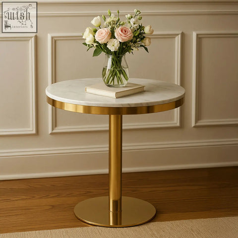 Azalea round marble dining table with polished gold metal base and round marble top for stylish dining spaces