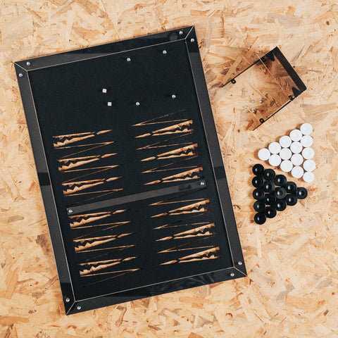 Black backgammon wall game with glossy finish and wooden checkers perfect as home board or wall deco piece