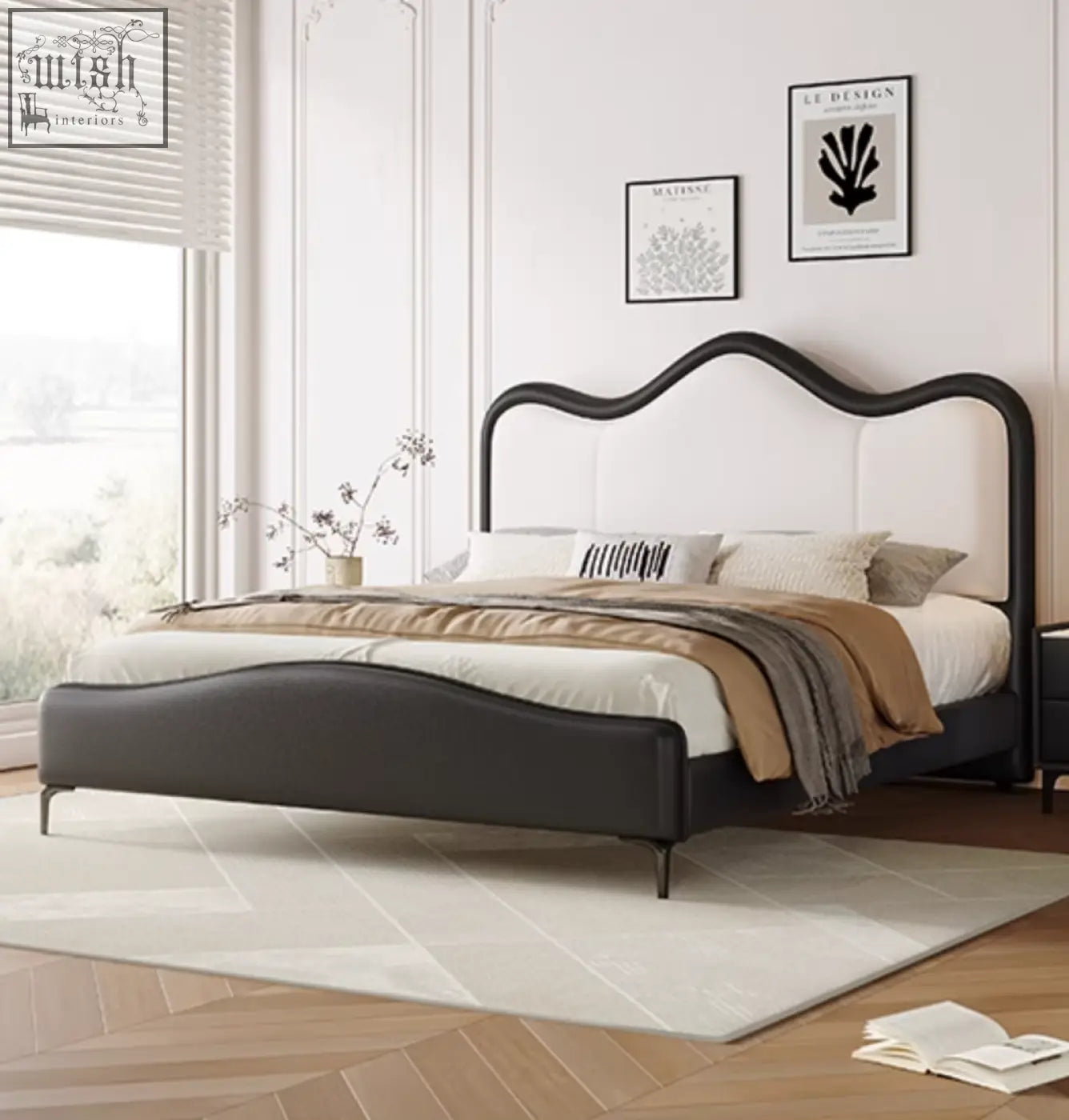Black and cream upholstered badham king size bed with curved headboard and sleek metal legs in leather