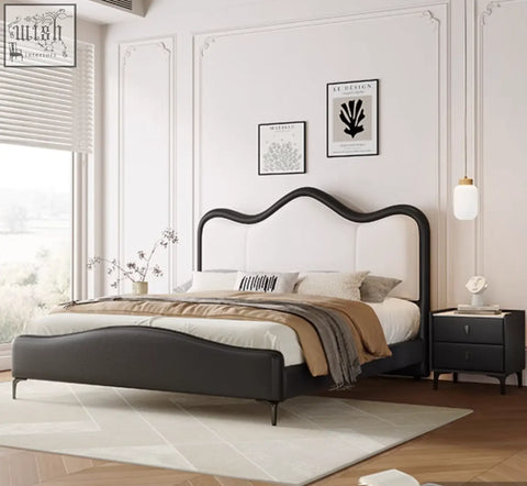 Modern black leather badham king size bed with curved upholstered headboard and matching footboard king size bed