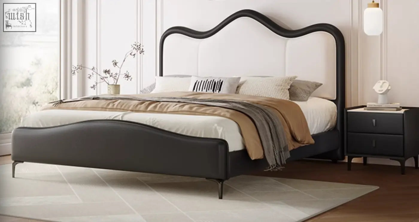 Modern badham king size bed with black and white leather upholstery and a curved headboard for stylish comfort