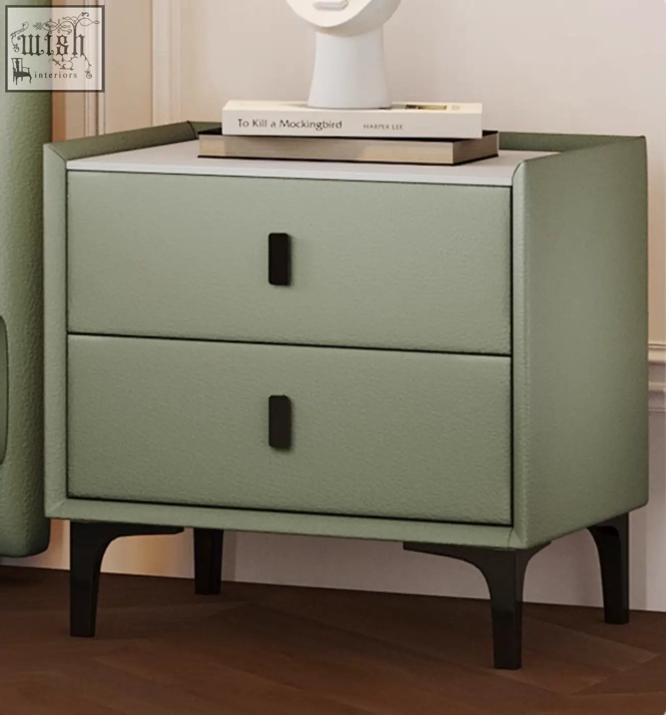 Modern sage green faux leather nightstand with sleek black handles and tapered legs for badham king size bed setup