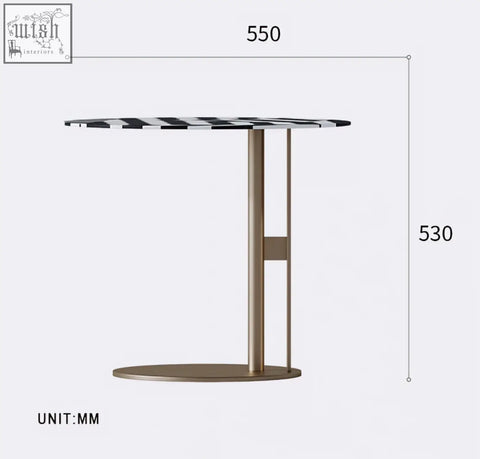 Bagley coffee table with modern round black and white checkered top and gold stainless steel legs and base