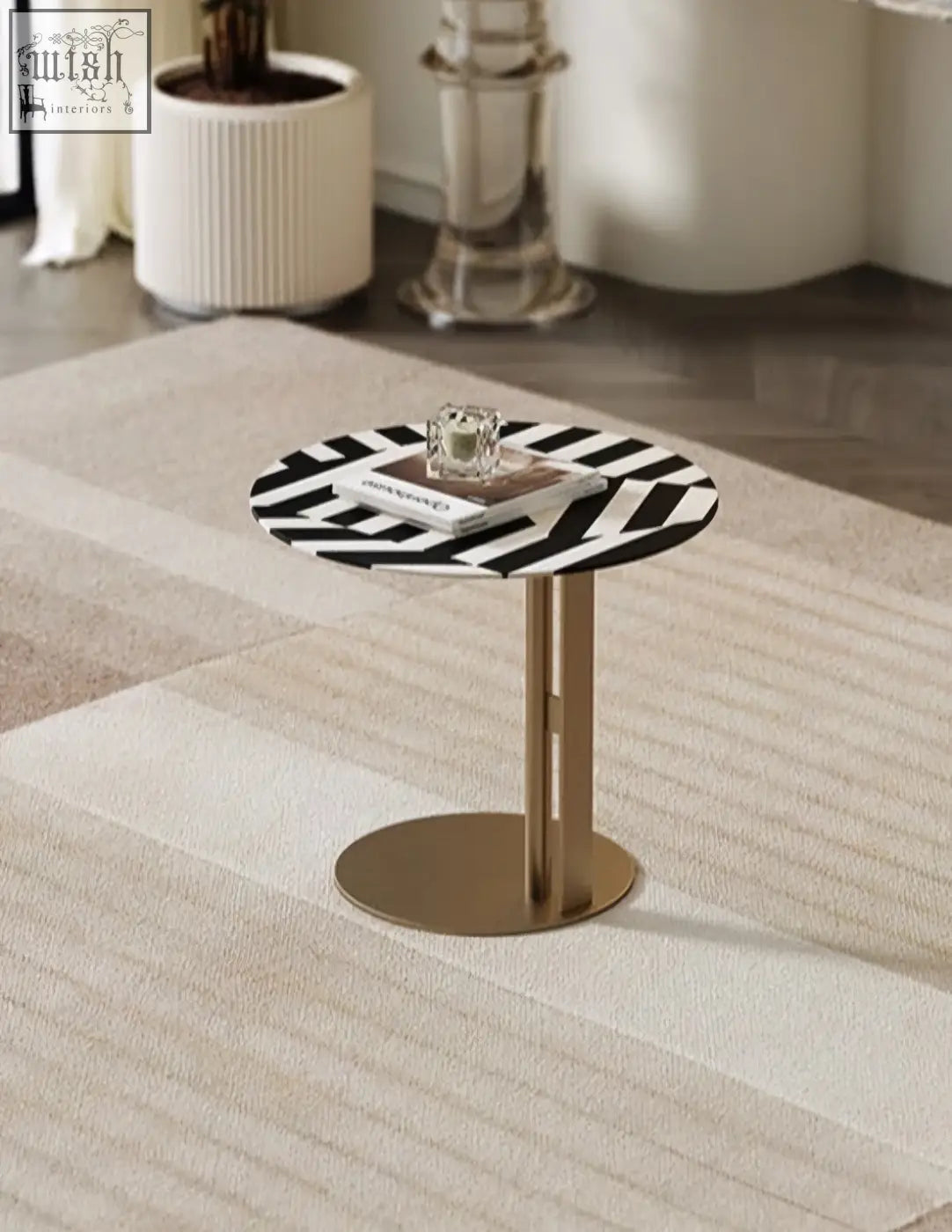 Bagley coffee table with sleek black and white geometric top and gold stainless steel legs perfect as a side or coffee table