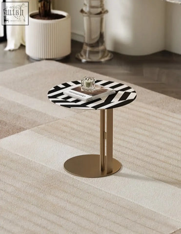 Bagley coffee table with sleek black and white geometric top and gold stainless steel legs perfect as a side or coffee table