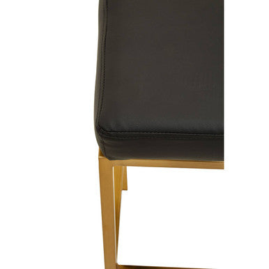 Baina black leather upholstered finish bar stool with gold finish bar legs and sleek modern design