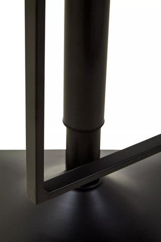 Black metal frame with cylindrical column base of baina white leather effect bar chair with black base bar