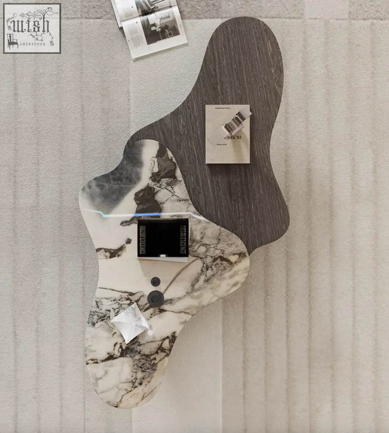 Modern abstract baines marble coffee table with two-tone dark wood and white marble design and black circular controls