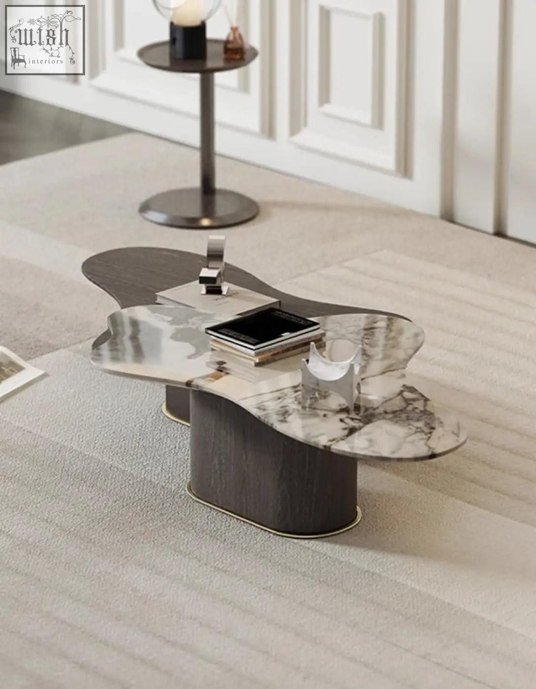 Modern baines marble coffee table with sleek organic shape dark wood base and white marble top with gray veining