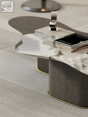 Modern baines marble coffee table with sleek white marble top dark veining and dark wood brass base for stylish living