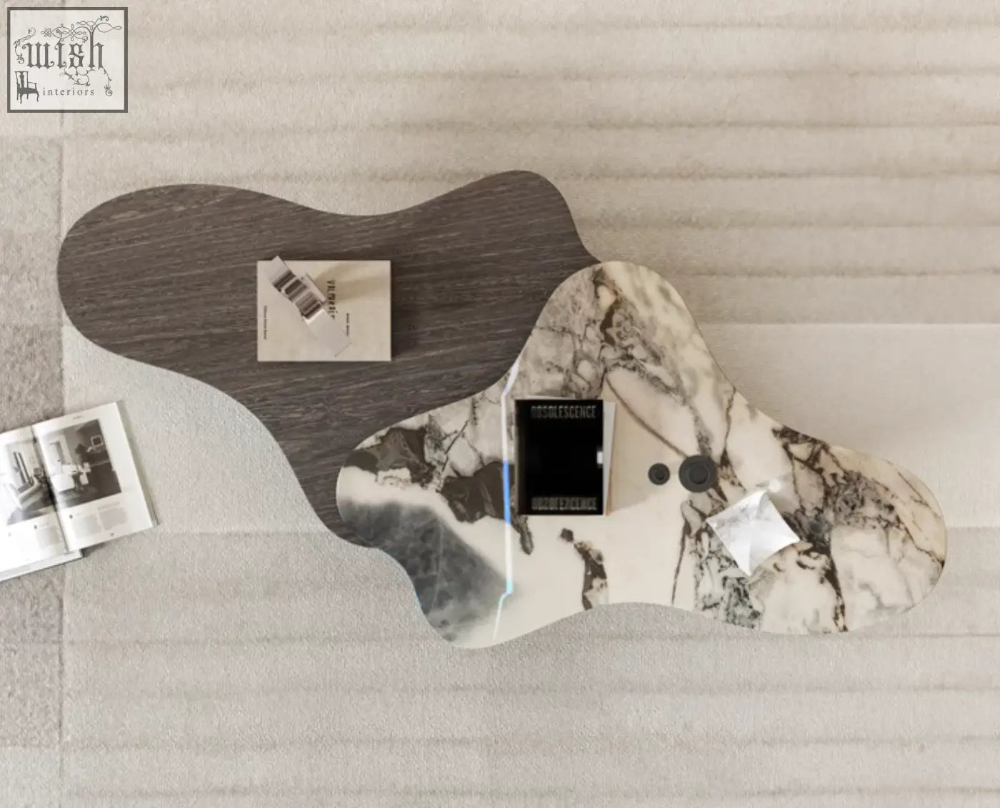 Organic-shaped baines marble coffee table with dark wood base and white marble patterned surface for stylish living rooms