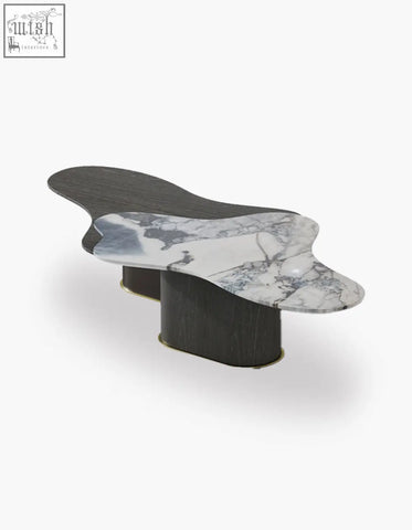 Organic-shaped baines marble coffee table with white marble top gray veining dark wood legs and gold accents