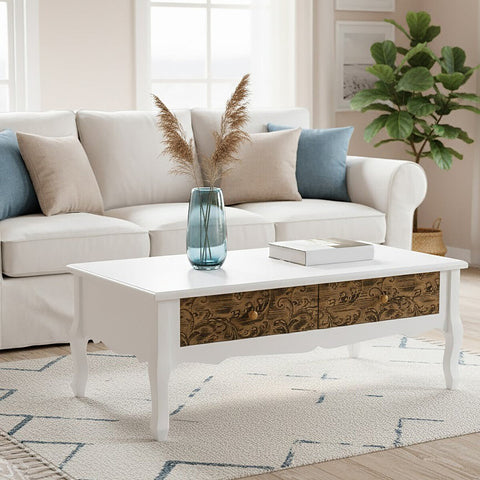 White bali coffee table with ornate brown patterned drawers and gold toned handles perfect for stylish living rooms