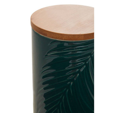 Dark green ceramic storage jar with bamboo lid and embossed palm leaf design perfect for kitchen storage