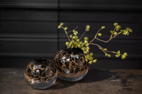 Two dutz collection ball vases in bronze gold mouth blown glass with black and gold crackled finish and dutz logo