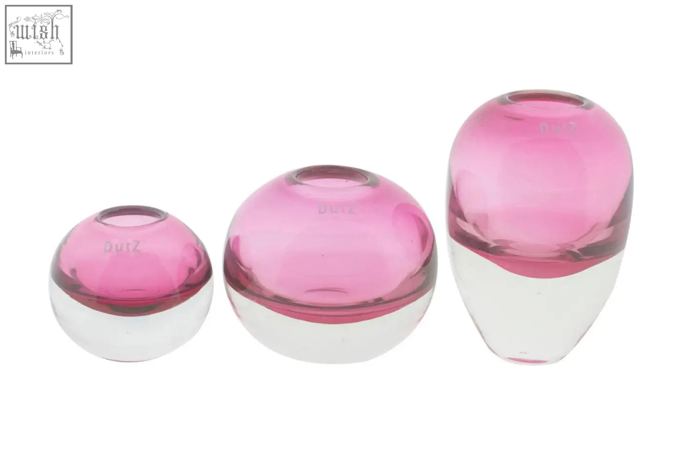 Set of three mouth blown dutz collection ball vases in translucent pink and clear glass with rounded bulbous shapes