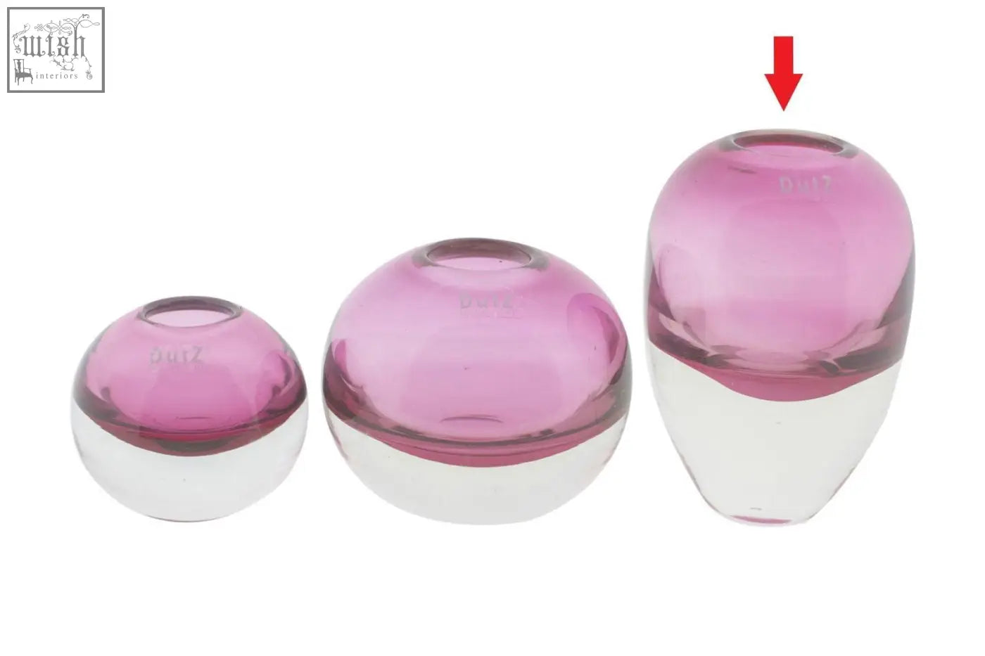 Set of three mouth blown glass ball vases in fuchsia pink from dutz collection with rounded bulbous shapes