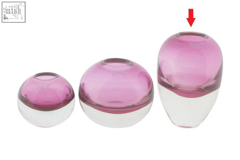 Set of three mouth blown glass ball vases in fuchsia pink from dutz collection with rounded bulbous shapes
