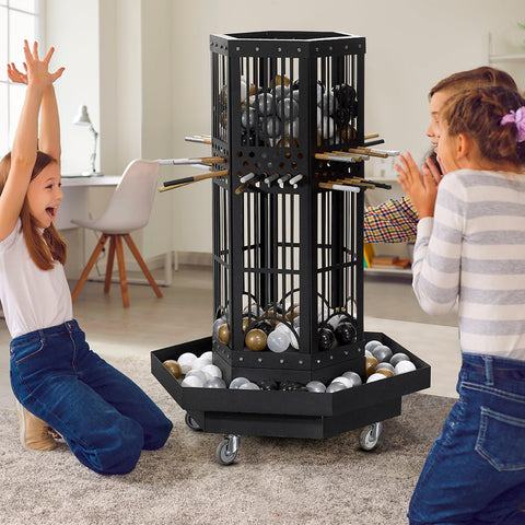 Black metal tower balance game with wheels filled with colorful balls and pool cues showcasing color scheme fun