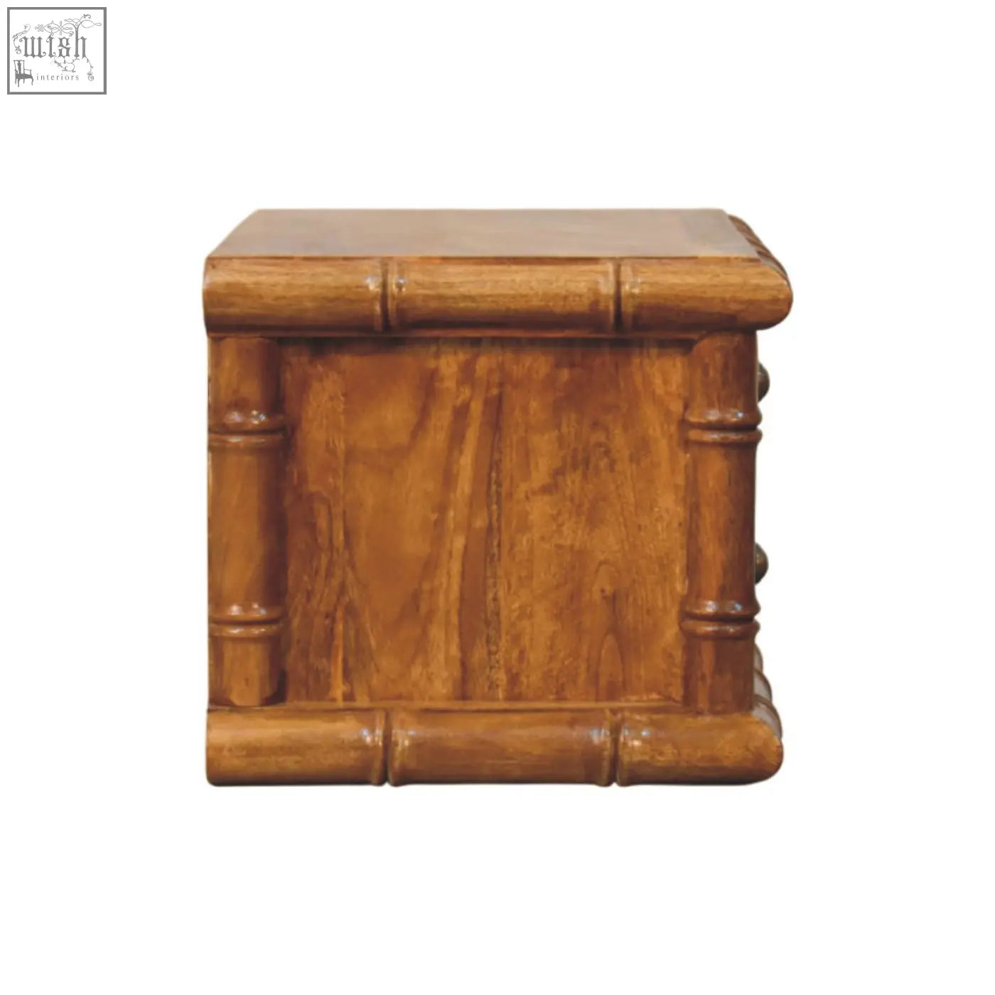 A polished bamboo bedside table with amber oak finish and detailed vertical grooves mimicking natural bamboo segments