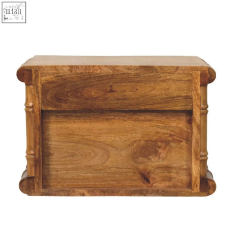 A rustic wooden bread box in amber oak finish with natural grain patterns perfect for bedside use