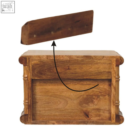 A rustic wooden bamboo bedside chest with hinged lid in warm amber oak finish showing natural wood grain