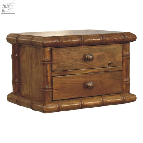 Bamboo bedside two-drawer nightstand with amber oak finish warm brown wood and metallic knobs