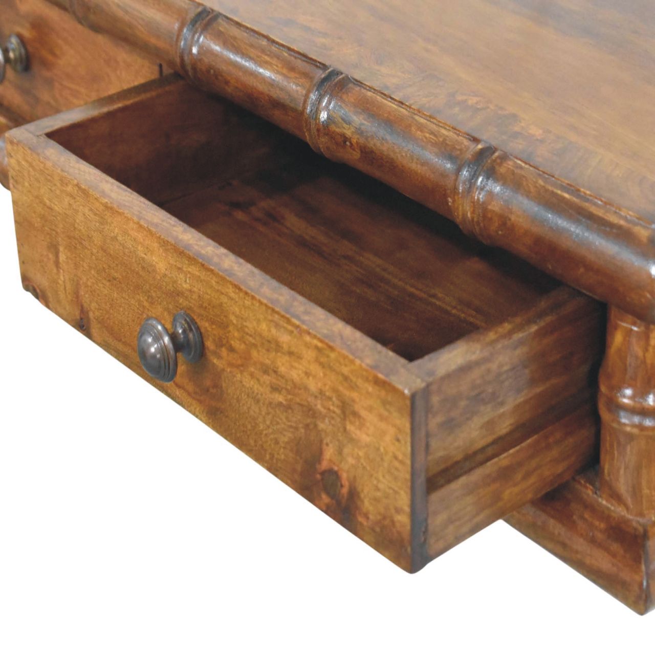 A rustic wooden console table with bamboo style legs and a warm brown finish perfect for entryways or living rooms