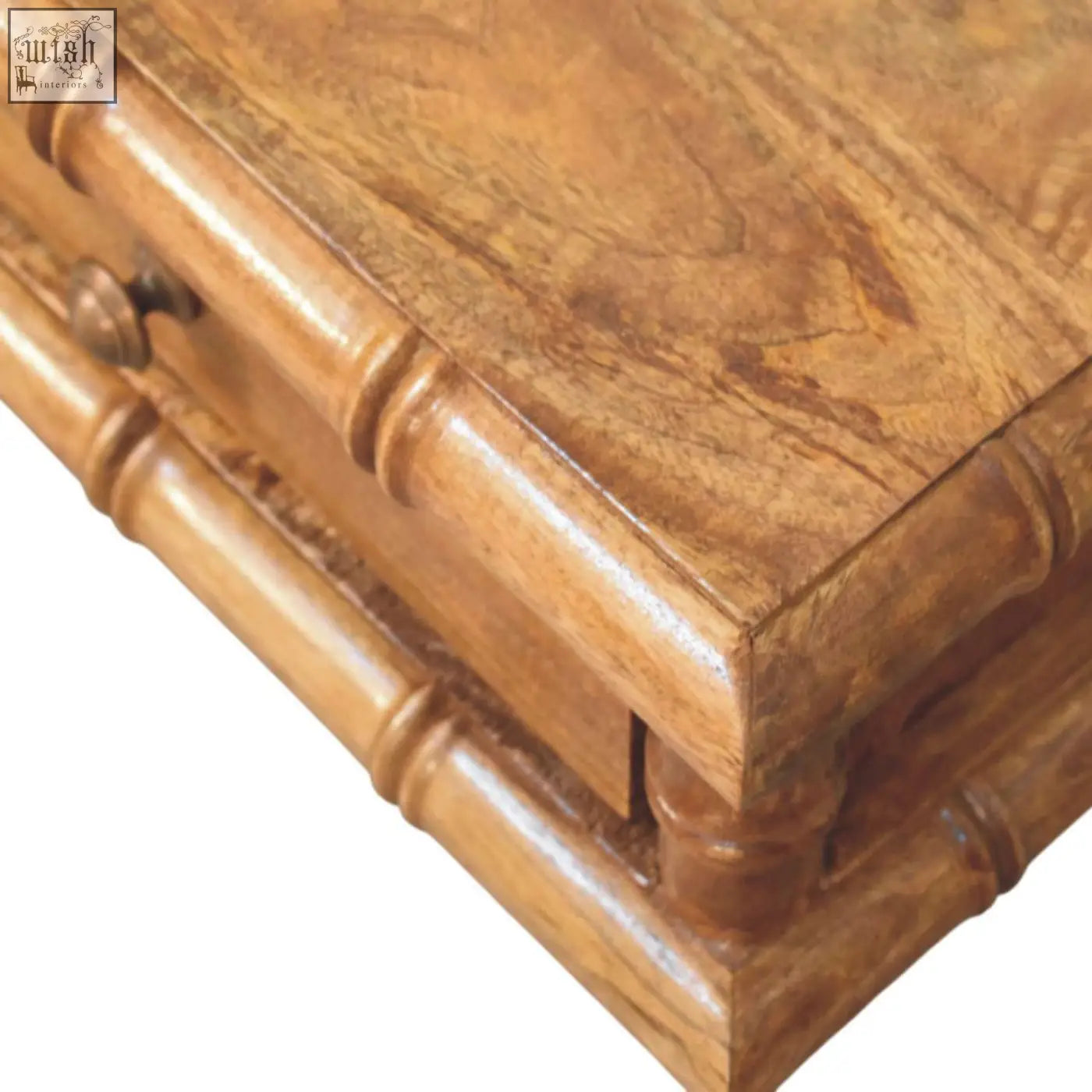 A polished wooden coffee table with bamboo-inspired design and visible grain patterns in warm brown tones