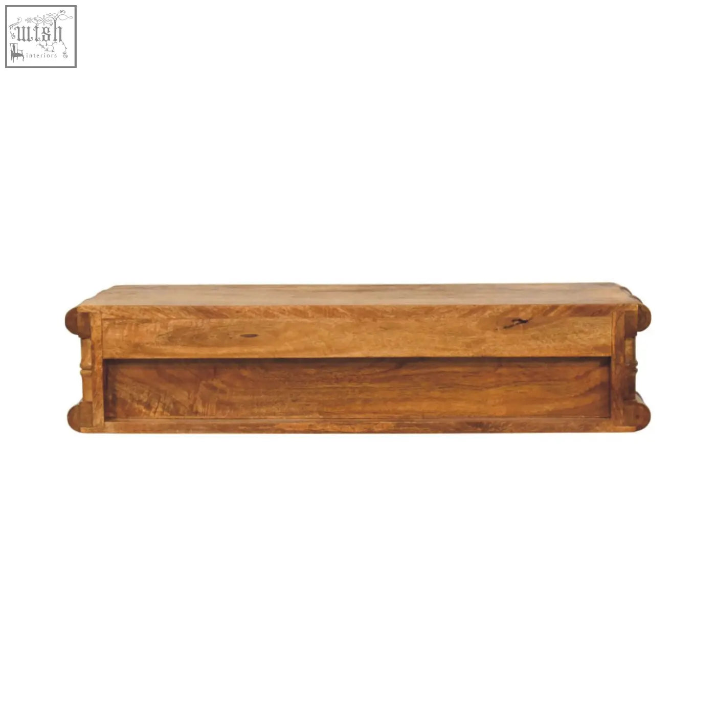 A rustic wooden coffee table with warm natural finish and carved corners shown with bamboo wall-mounted console