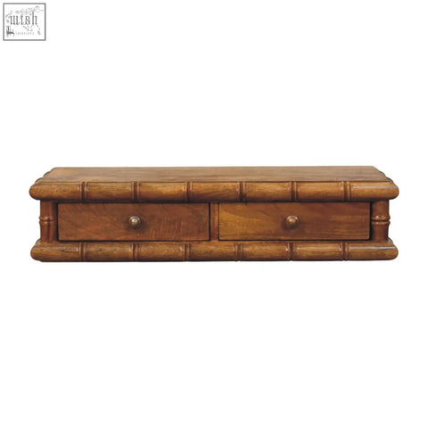 Bamboo wall-mounted console with two drawers and round metal knobs made of bamboo wood in natural finish