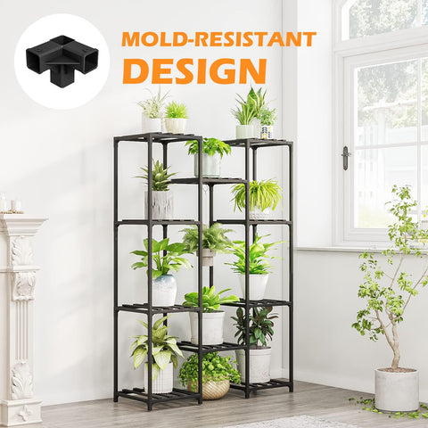 Black metal bamworld plant stand with multiple shelves holding potted green plants for indoor outdoor use