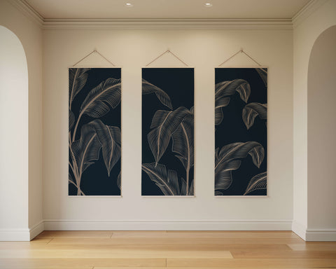 Three-panel dark navy banana leaf tapestry with intricate white line drawings for banana leaf wall decor