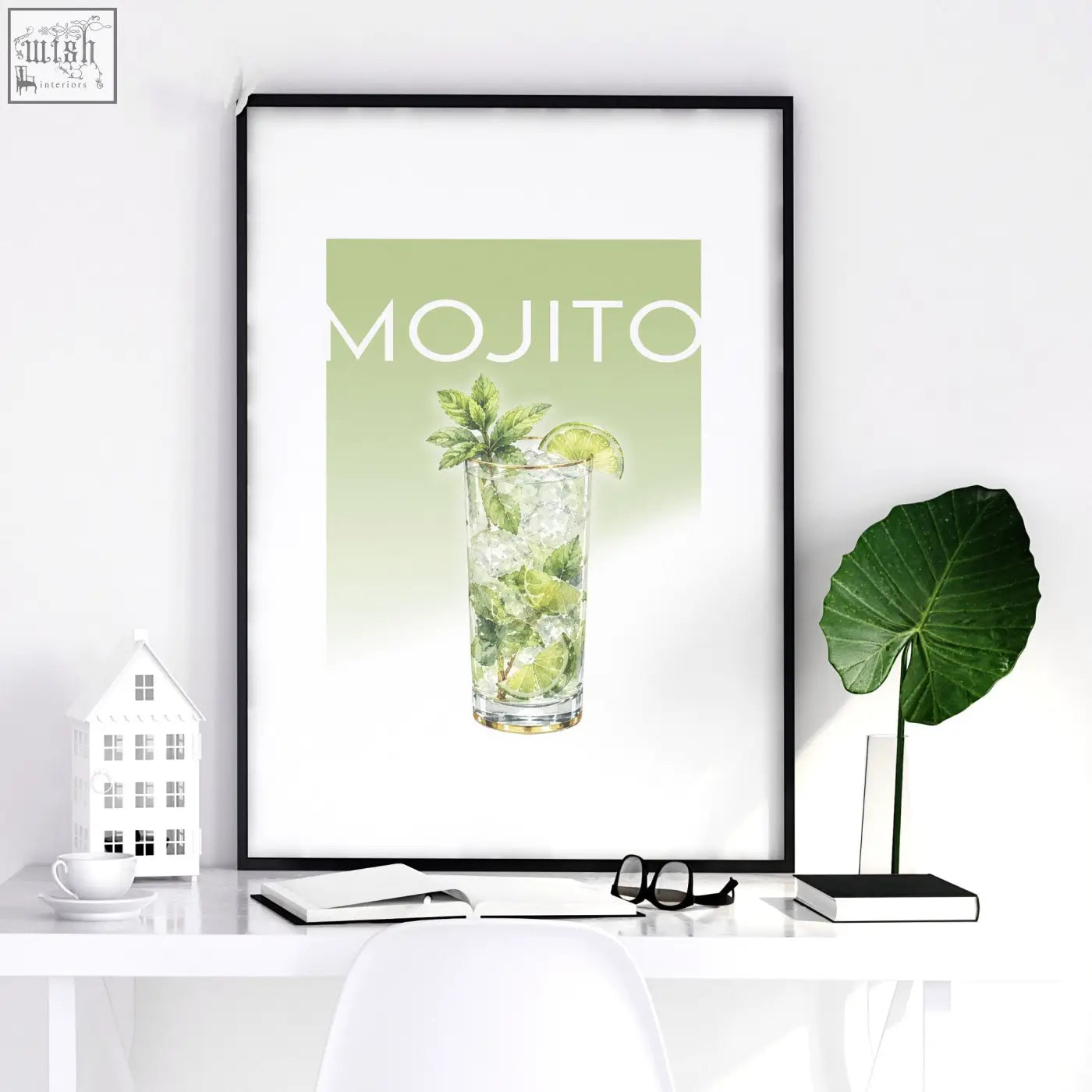 A framed mojito pastel cocktail print with mint and lime in soft green perfect for living room bar wall art decor