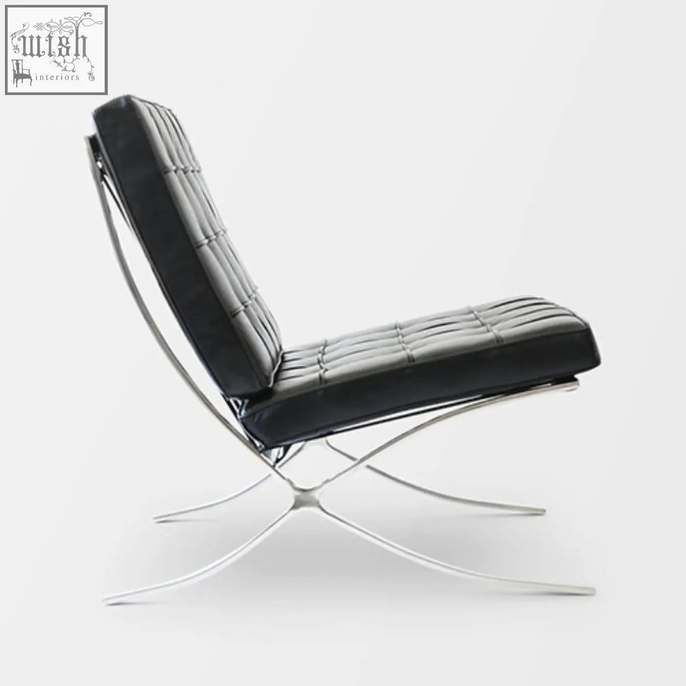 Black real leather barcelona chair with a sleek chrome x-shaped base perfect for stylish seating