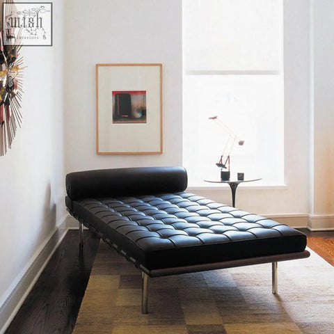 Black real leather barcelona daybed with tufted design and painted steel chrome legs for stylish lounging