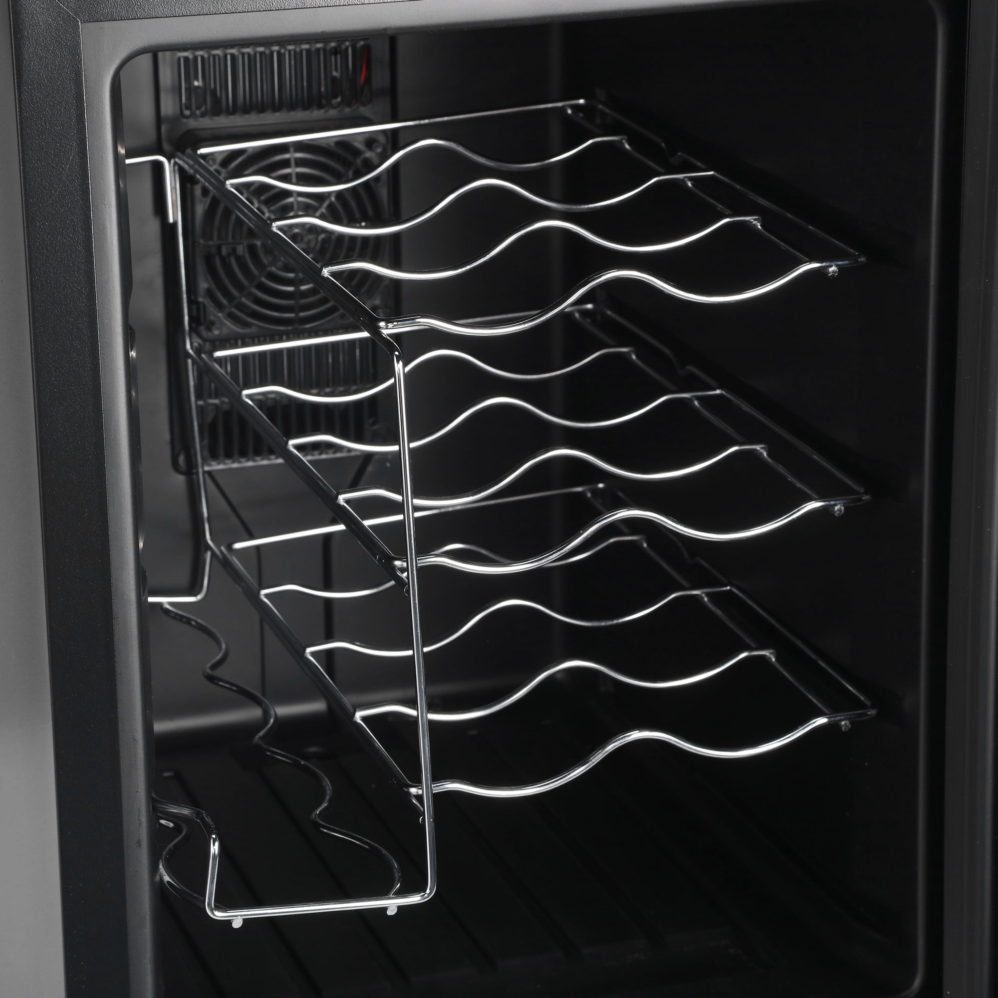 Silver wire wine rack with wavy slots for bottle storage inside barcool vino12 led wine display fridge