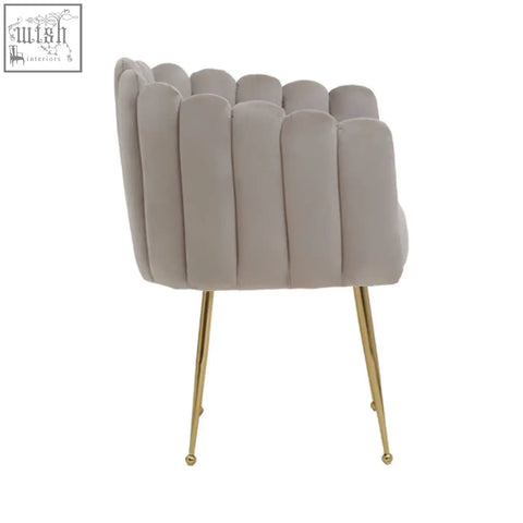 Beige mink velvet scalloped dining chair with gold tone metal legs perfect for stylish dining spaces