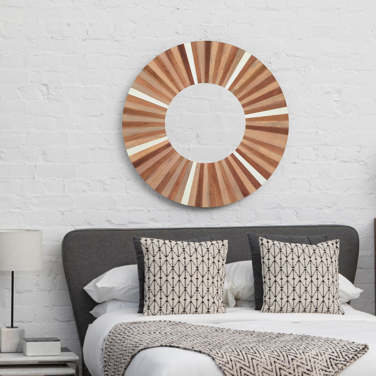 Barn natural wood wall mirror with circular sunburst pattern of light and medium-toned natural wood slats