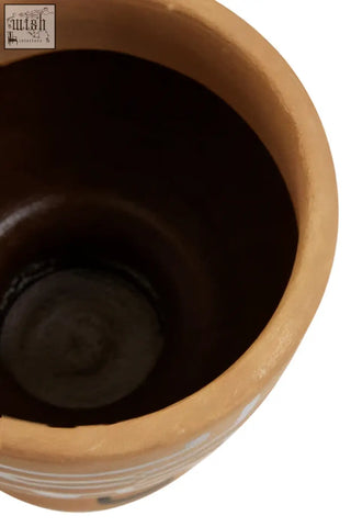 Barren hand painted earthenware planter with smooth brown finish and subtle horizontal ridges near the base
