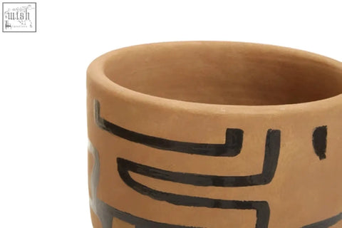 Terracotta hand painted earthenware planter with black geometric patterns perfect for indoor plants