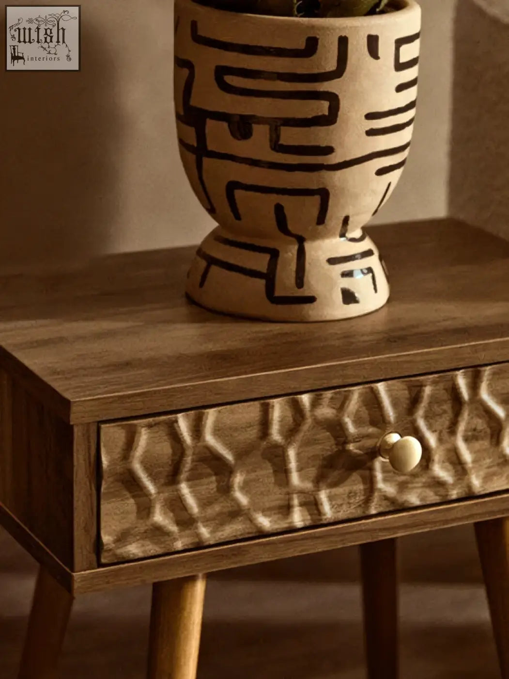 Cream-colored hand painted earthenware planter with black geometric maze patterns perfect for indoor plants