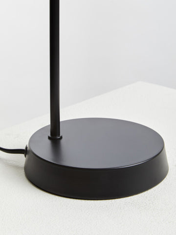 Black matte metal table lamp base with sleek circular design for bart copper desk lamp in stylish workspace
