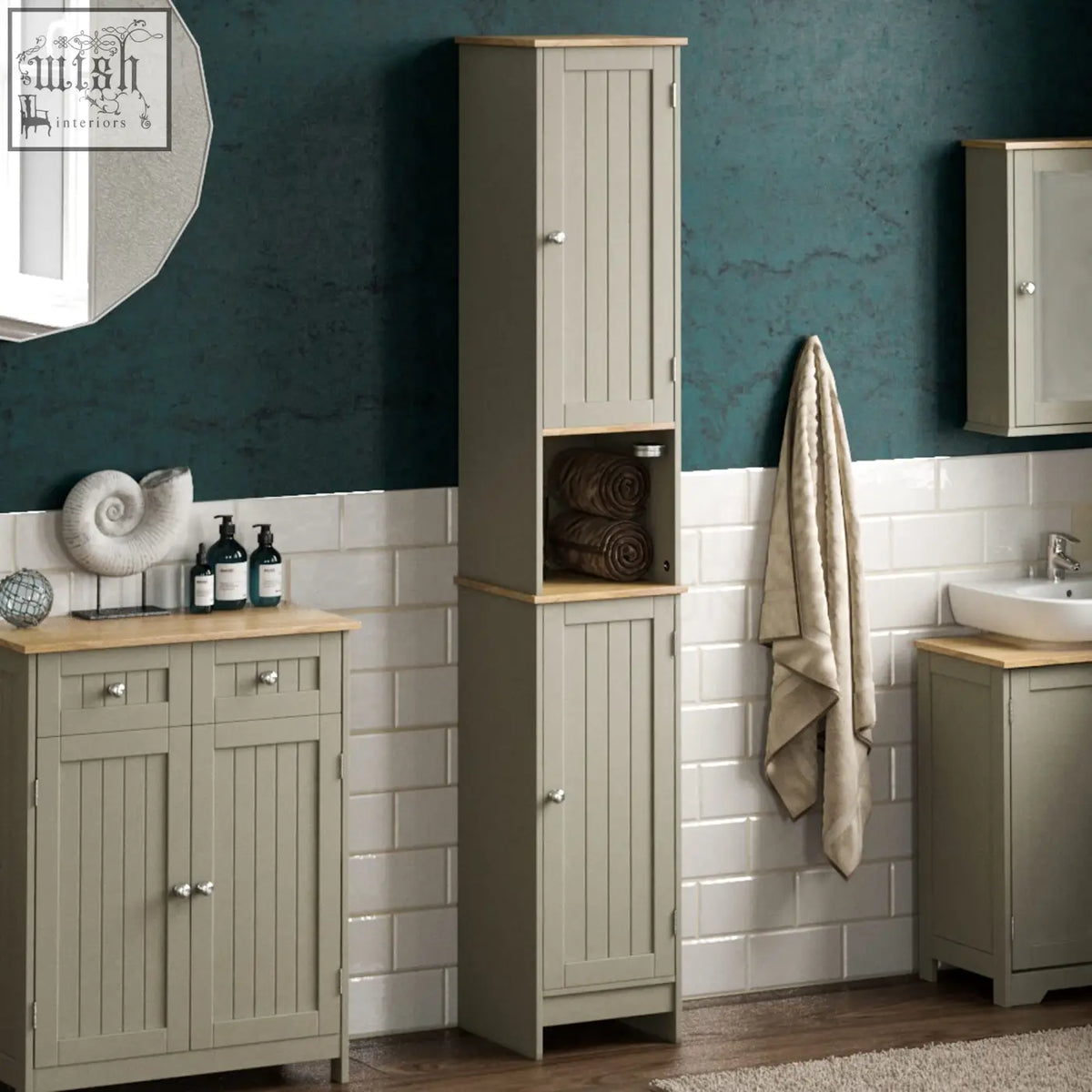 Tall sage green wooden bathroom cabinet with light oak top and vertical panel doors by bath vida priano