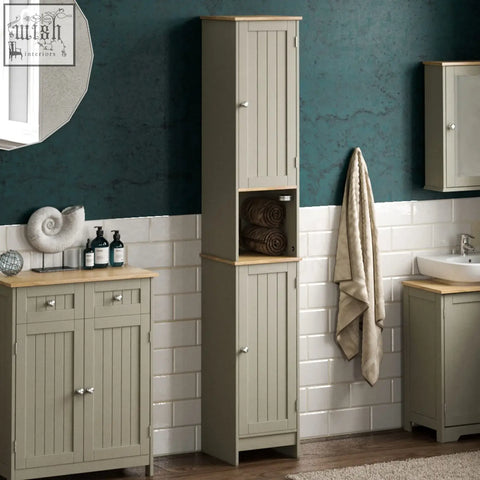 Tall sage green wooden bathroom cabinet with light oak top and vertical panel doors by bath vida priano