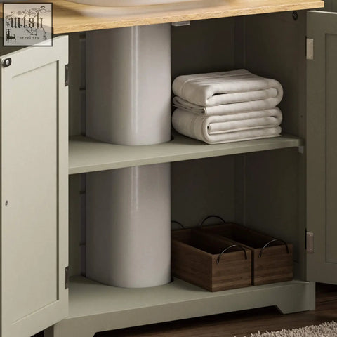 Bath vida priano bathroom cabinet in light green with natural wood countertop and open shelving for under sink storage