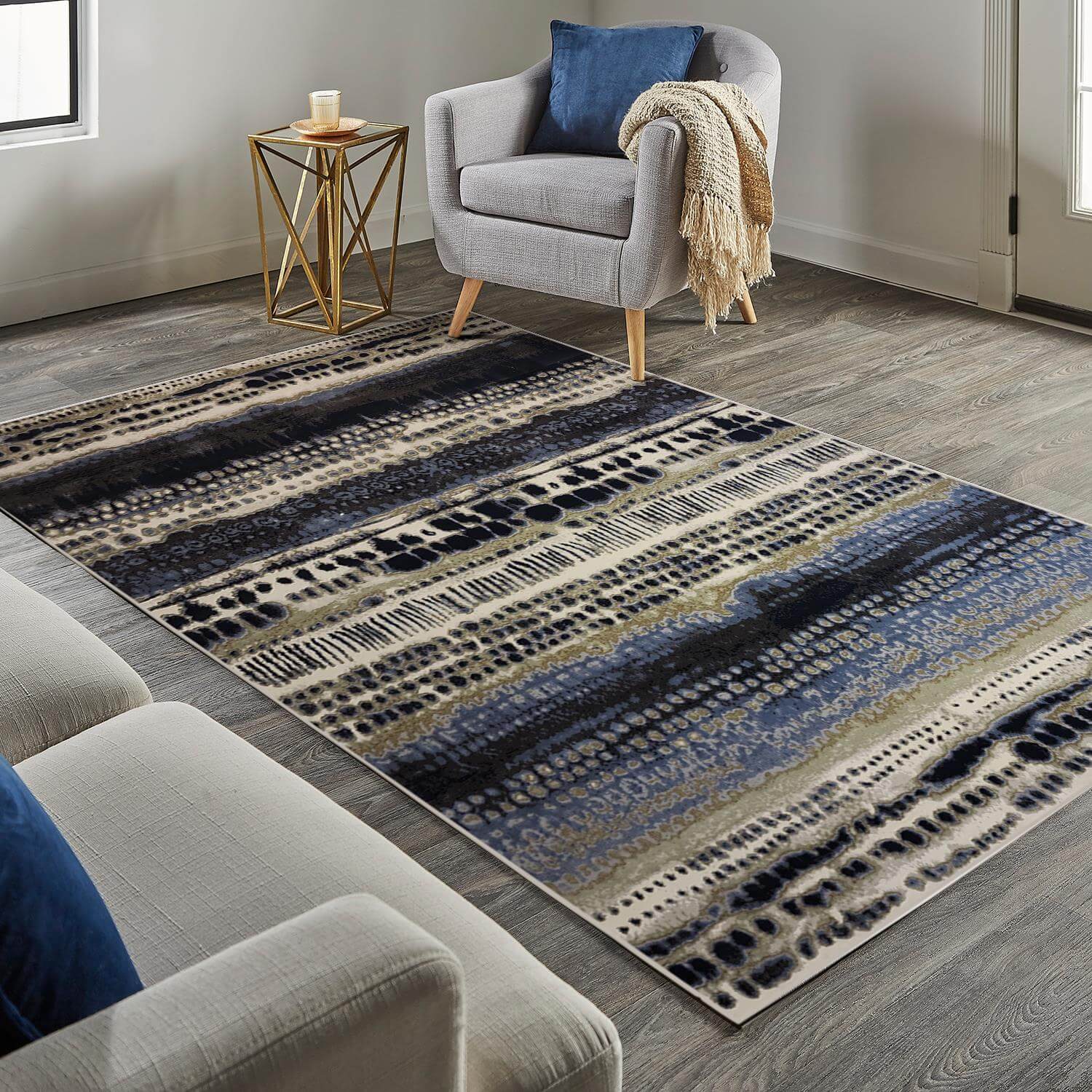 Modern rectangular batik multicolour abstract rug with navy, blue, beige, and black horizontal stripes